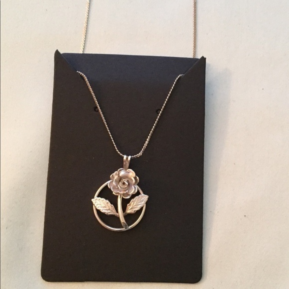 Silver tone rose necklace